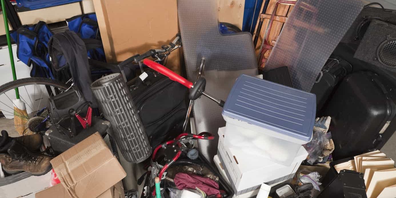 Storage pile of sporting gear, music equipment, suitcases, files, boxes and more.